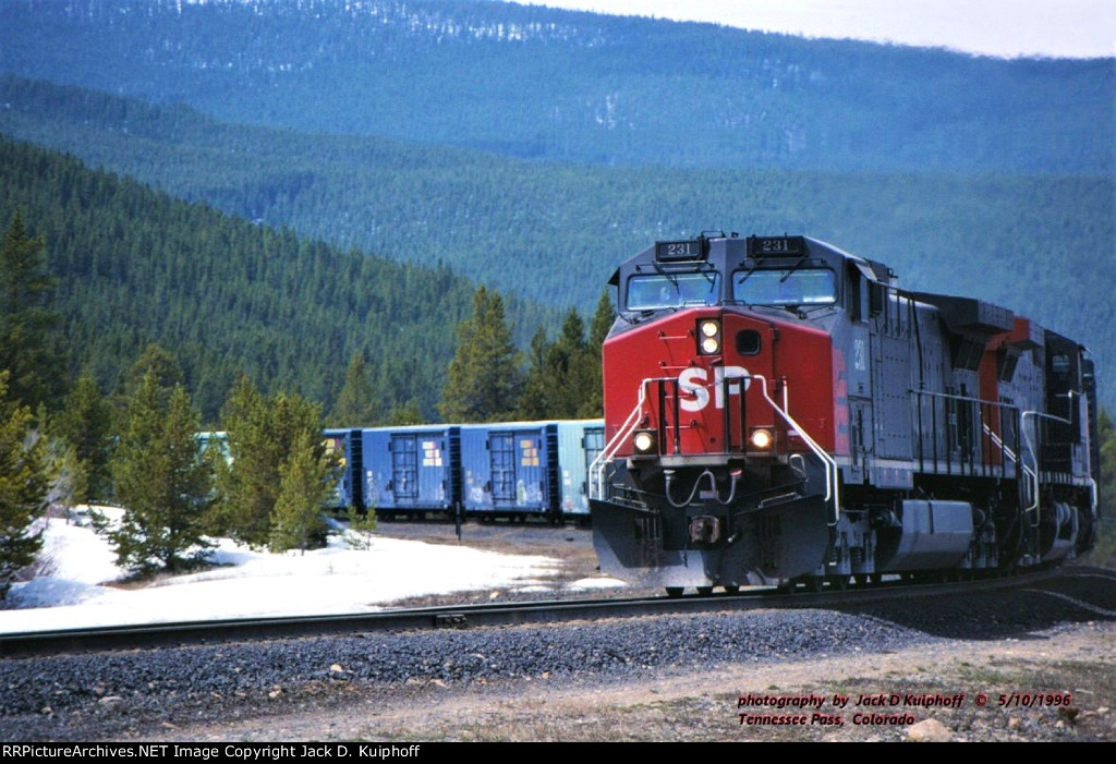 SP, Southern Pacific 231-252 east climbing the up D&RGWs 3.5% grade at Tennessee Pass, Colorado. May 10, 1996. 